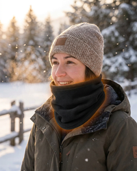 Hero shot - person wearing heated neck gaiter in winter